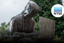 Satoshi Nakamoto statue outside New York Stock Exchange symbolizing crypto acceptance