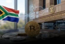 Illustration of cross-border cryptocurrency transfers with South Africa's flag, representing proposed reporting rules for offshore exchanges and non-custodial wallets.